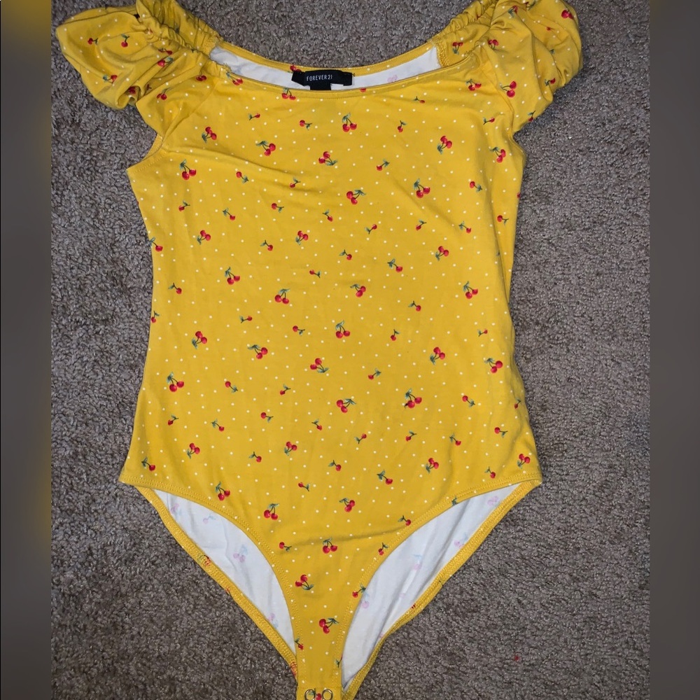 Yellow off the shoulder body suit shirt